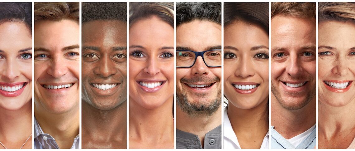 Diverse smiling faces in professional headshots